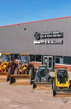 heavy equipment parked in front of business