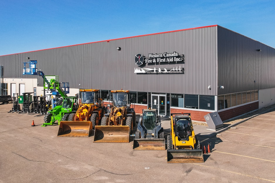 heavy equipment parked in front of business