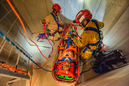 Simple Rescue Photo - Western Canada Fire & First Aid workers performing a simple rescue in a confined space