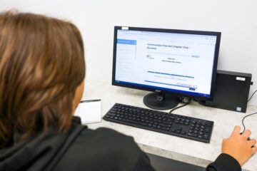 students working on a blended first aid + CPR Training Course On a Computer
